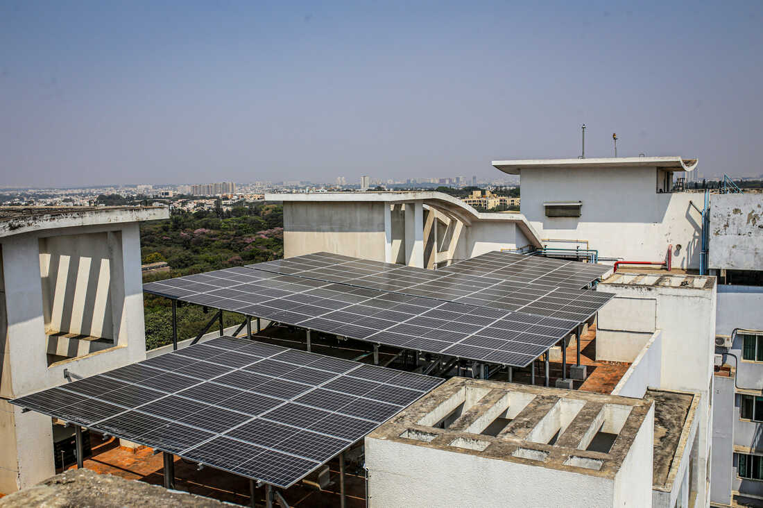  Rooftop solar panels in Dausa, Rajasthan , emphasizing the shift towards sustainable energy practices in city landscapes.